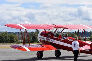 Photos by Haley Ausbun.                                 Seniors in nearby care facilities took flight in a 1942 Boeing Stearman biplane at Renton Municipal Airport, offered by Ageless Aviation Dreams Foundation.