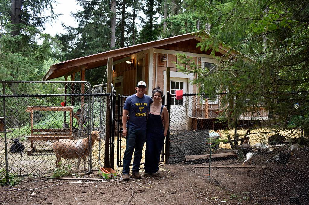 Photos by Haley Ausbun. The BackYardFarm, a local couple trying to help folks with small yards build their own farm, hosted an event July 27, where guests could meet the animals, feed the goats and eat food sourced from their own back yard.
