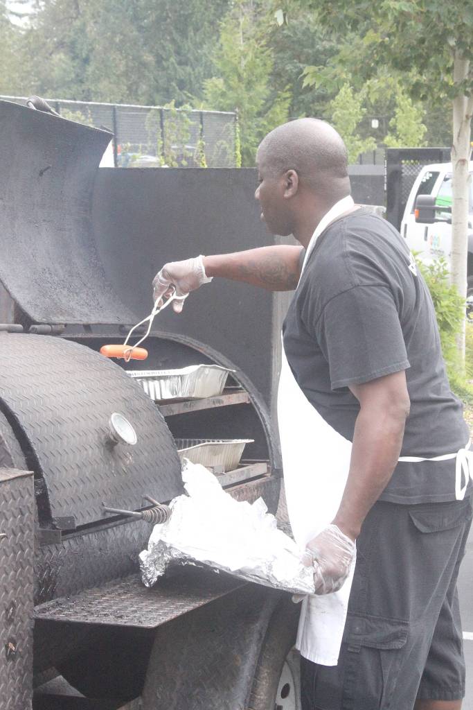 Hundreds of sausages were grilled up and sold during the 2019 Covington Sausage and Cider Fest on Saturday, Aug. 17. Photo by Danielle Chastaine.