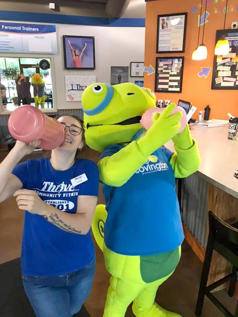 Covington mascot Karma Chameleon visits a local Covington gym to inspire more children to participate in Play Unplugged. Photo courtesy of the Covington Chamber of Commerce.