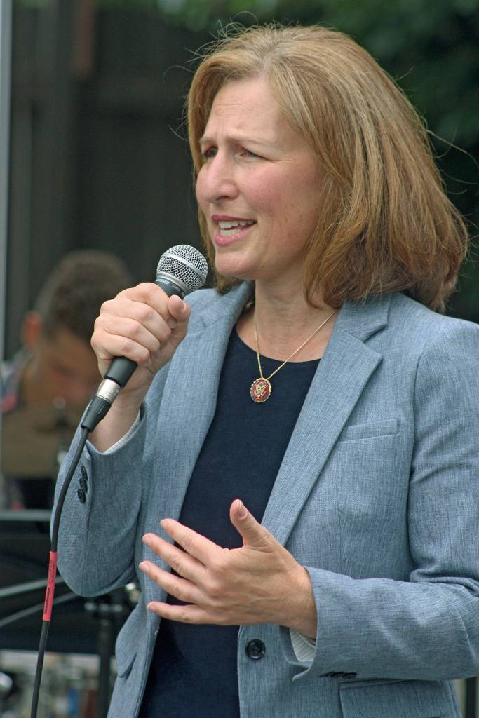 U.S. Rep. Kim Schrier, D-Wash., speaks to a gathering outside HealthPoint Auburn North on Thursday afternoon. The Congresswoman talked about the importance of childhood immunizations. MARK KLAAS, Auburn Reporter                                Rep. Kim Schrier spoke outside Auburns HealthPoint Auburn North on Aug. 22. Photo by The Auburn Reporter