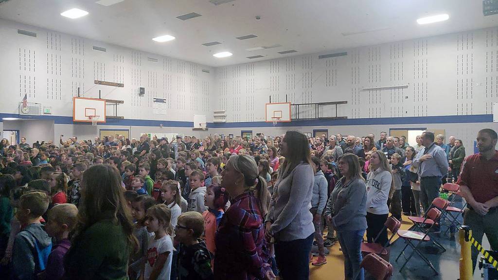 Hundreds of students, veterans and their families crowded into the Glacier Park Elementary School gymnasium for a special Veterans Day Assembly held by the fifth grade class on Friday, Nov. 8. Photo by Danielle Chastaine.                                 Hundreds of students, veterans and their families crowded into the Glacier Park Elementary School gymnasium for a special Veterans Day Assembly held by the fifth grade class on Friday, Nov. 8. Photo by Danielle Chastaine.