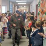 The Glacier Park Elementary School fifth grade class lined the halls after a special Veterans Day assembly to give high fives and applause to veterans, who were led through the halls after being honored by the school on Friday, Nov. 8, 2019. Photo by Danielle Chastaine.                                 The Glacier Park Elementary School fifth grade class lined the halls after a special Veterans Day assembly to give high fives and applause to veterans, who were led through the halls after being honored by the school on Friday, Nov. 8, 2019. Photo by Danielle Chastaine.                                 The Glacier Park Elementary School fifth grade class lined the halls after a special Veterans Day assembly to give high fives and applause to veterans, who were led through the halls after being honored by the school on Friday, Nov. 8, 2019. Photo by Danielle Chastaine.