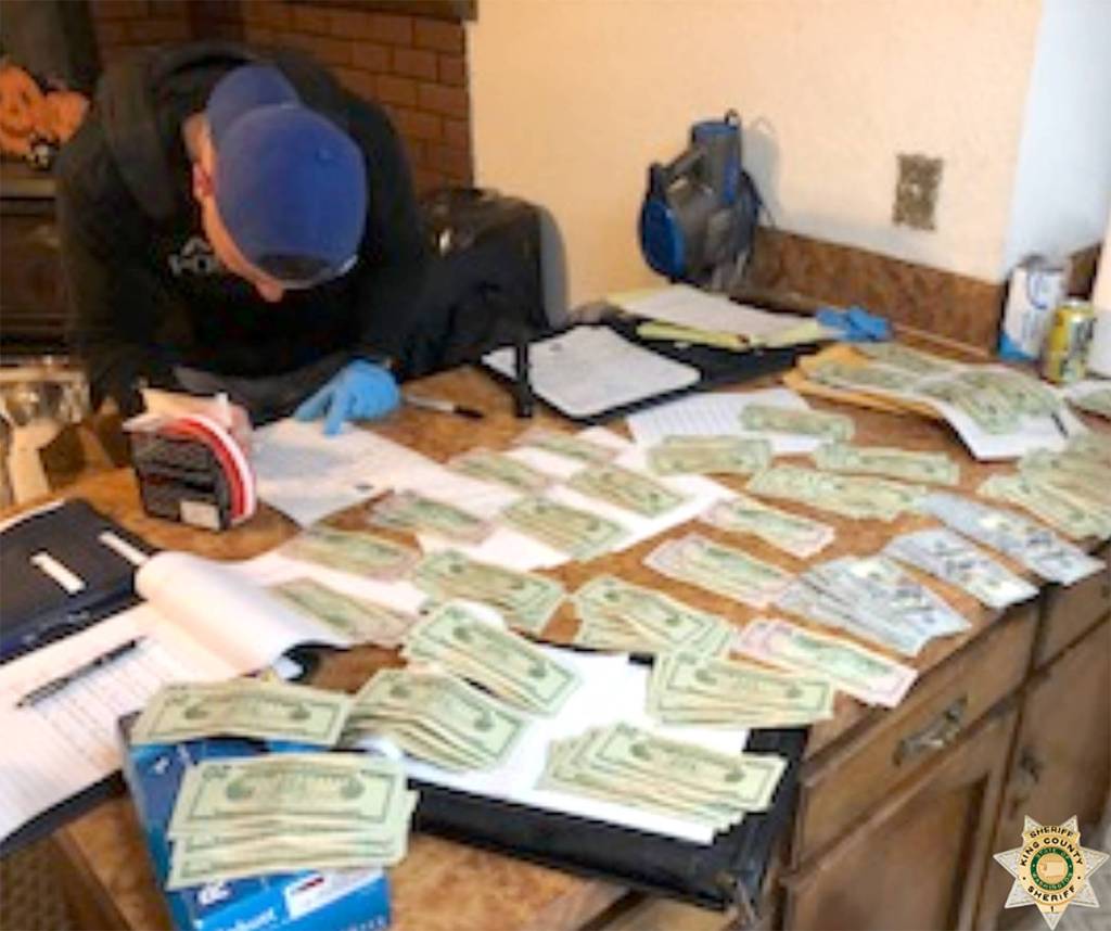 Stolen guns, illegal drugs and cash found in Covington home