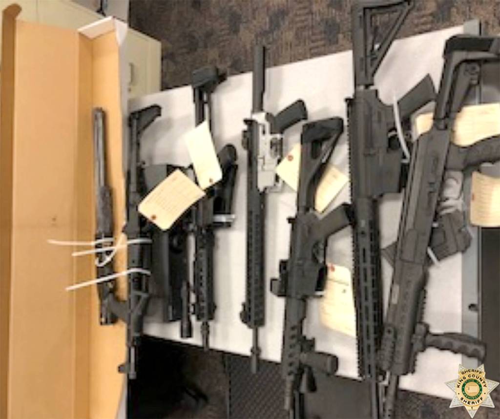 Stolen guns, illegal drugs and cash found in Covington home