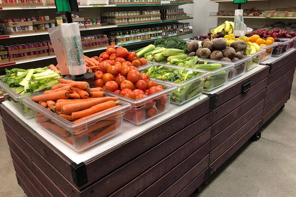 Maple Valley donates food, $8,500 to food bank