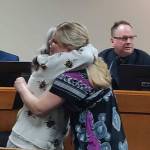 Debra Stevens, left, hugs Laura Mitchell, right, during the Covington City Council meeting on Monday, Jan. 27, 2020, where Mitchell was being honored for performing CPR and saving Stevens life on Dec. 19, 2019. Photo by Danielle Chastaine.