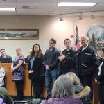 A large group of audience members and honorees listed to Puget Sound Regional Fire Authority Captain Joe Root speak about how CPR can save a persons life during an emergency during the regular Covington City Council meeting on Monday, Jan. 27, 2020. Photo by Danielle Chastaine.