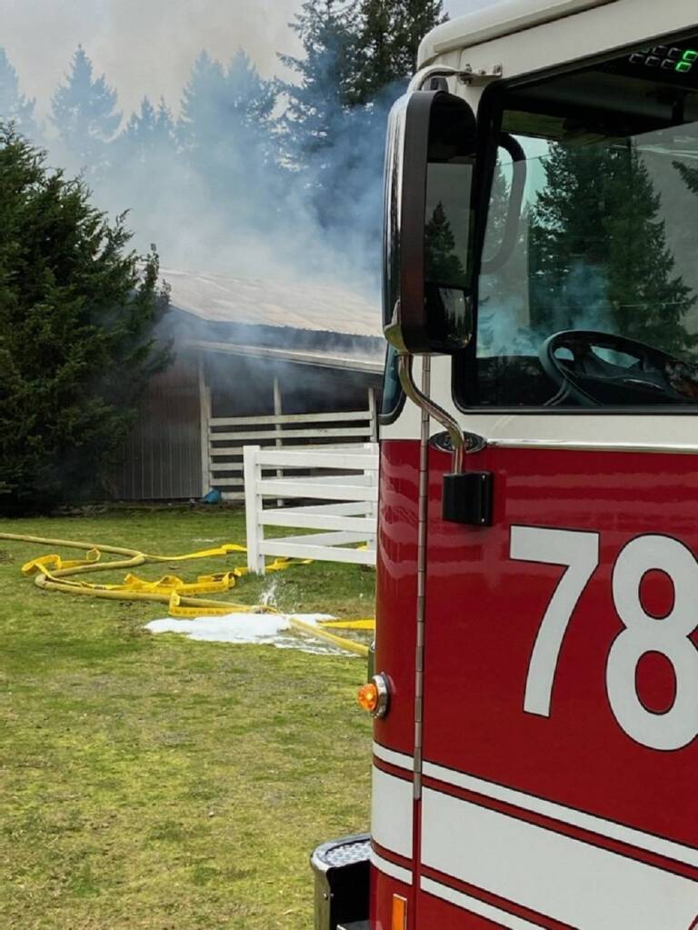 A fire truck arrives at the scene of a barn fire on Friday, Feb. 14, in Covington. Photo courtesy of the Puget Sound Regional Fire Authority.