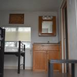 Photo by Haley Ausbun. A preview of the first modular unit being used to house King County residents under quarantine for COVID-19, coronavirus. The units will be located on a county-onward parcel in White Center, where an old office building is planned to be demolished to make space.