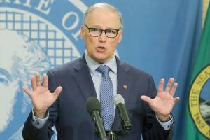 Governor: Many COVID-19 restrictions to linger after May 4