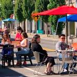 Last summer, people took advantage of the outdoor dining along First Avenue between Gowe and Titus streets in downtown Kent. In Phase 2 of the governors reopening plan, which was announced Jan. 28, restaurants can reopen at a maximum 25% capacity and a limit of six people per table. Photo courtesy of Kent Downtown Partnership