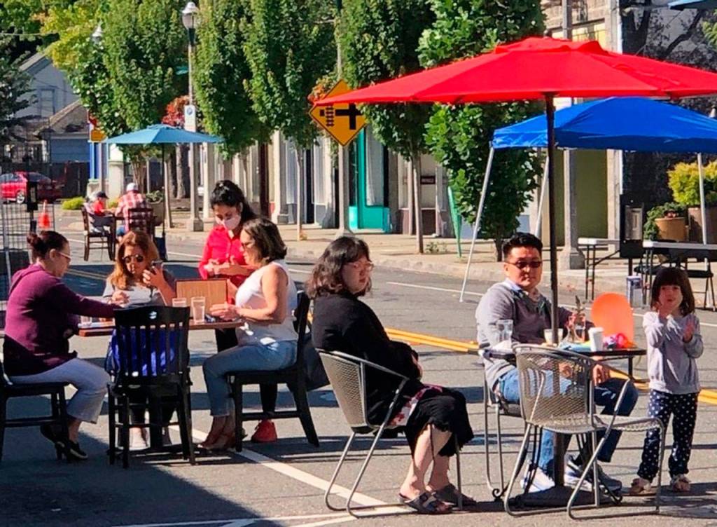 Last summer, people took advantage of the outdoor dining along First Avenue between Gowe and Titus streets in downtown Kent. In Phase 2 of the governors reopening plan, which was announced Jan. 28, restaurants can reopen at a maximum 25% capacity and a limit of six people per table. Photo courtesy of Kent Downtown Partnership