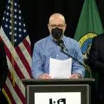 Public Health Officer Jeff Duchin (center), joined by King County Executive Dow Constantine (left) and Seattle Mayor Bruce Harrell announced, the countys decision to lift the vaccination verification requirement for King County businesses beginning on Mar. 1, 2022. The announcement was made during a press briefing on Wednesday, Feb. 16. (Screenshot)