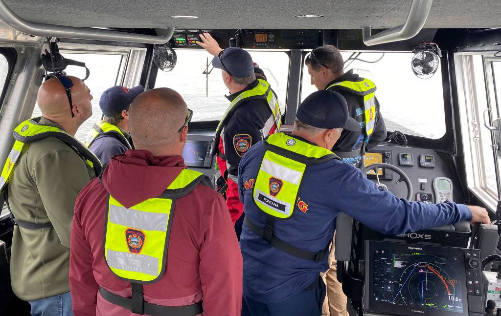 South King Fire and Rescue members provide a tour of the new vessel to firefighters from Chesapeake, Virginia. Olivia Sullivan/the Mirror