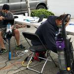 Volunteers in 2021 work to repair home items like kitchen appliances and vacuum cleaners (pictured) at the county-sponsored repair events. Photo courtesy of King County Solid Waste Division.