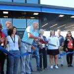 Renton Mayor Armondo Pavone and several members of the Renton City Council accompany Topgolf Renton Director of Operations Paul Howard for the ribbon-cutting ceremony. Photo by Bailey Jo Josie/Sound Publishing