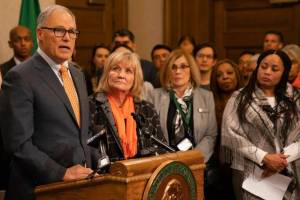 Gov. Jay Inslee, left, with First Lady Trudi Inslee at a press conference advocating for laws to prevent gun violence. (Provided by the Washington State Governors Office)