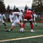 Kentwood High captain Trevor Robertson makes a tackle in his own box against Thomas Jefferson. BEN RAY, Kent Reporter
