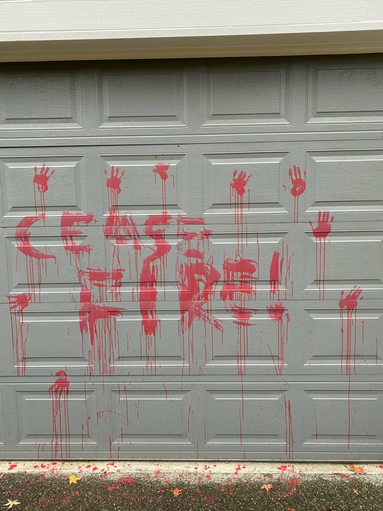On the night of Thursday, Nov. 30 in Bellevue, people who Congressman Adam Smith said were advocating for a cease-fire in Israel and Gaza, vandalized his garage with spray paint. (Photo Courtesy of the Office of Congressman Adam Smith)