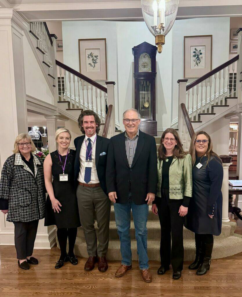 From the right stands First Lady Trudi Inslee, Meghan Banta, Kindering Board President Phil Banta, Gov. Jay Inslee, Rep. Tana Senn and Kindering CEO Dr. Lisa Greenwald. Photo Courtesy of Kindering