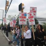 Workers stand outside of the Renton Boeing plant on the first day of the strike. Photo by Bailey Jo Josie/Sound Publishing.