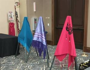 The Lummi Nation provided three colorful shawls during the MMIWP Task Force Summit in September, with turquoise representing human trafficking, purple representing overdoses (losing our people from fentanyl) and red representing murdered and missing Indigenous women  all crises that affect North American Natives and Tribes. The summit started with an opening ceremony with words from Lummi Tribal Chair Anthony Hillaire, Lummi Indian Business Council Secretary Lisa Wilson and a Shawl Ceremony with Lhaqtemish singers. Photo by Bailey Jo Josie/Sound Publishing