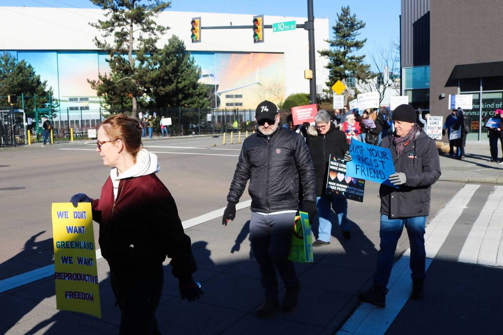 Protesters cross the street in Renton at the T-intersection of Logan and 10th. Photo by Bailey Jo Josie/Sound Publishing.