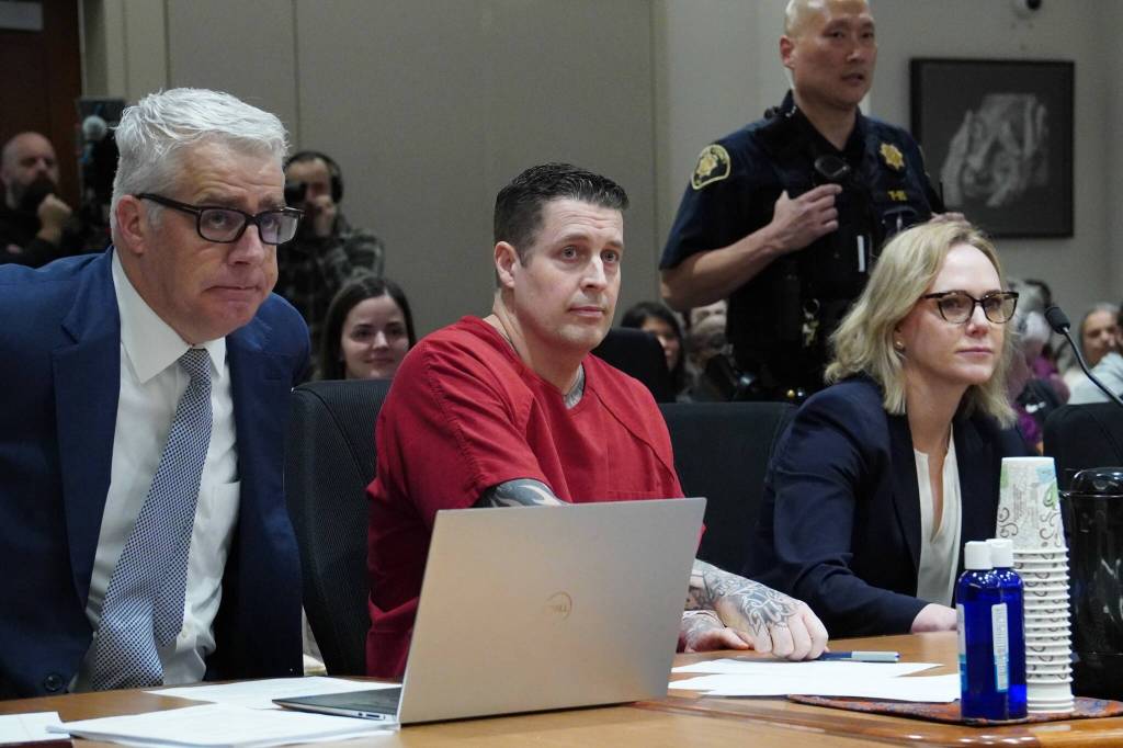 Jeffrey Nelson with his attorneys. Photo by Joshua Solorzano/Sound Publishing