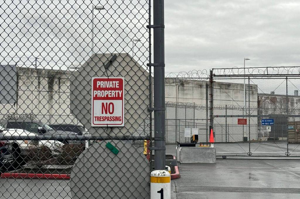 A no trespassing sign outside of the Northwest ICE Processing Center in Tacoma. (Grace Deng/Washington State Standard)