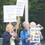 Many signs were displayed at the June 14 protest in Covington. STEVE HUNTER, Kent Reporter