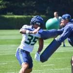 Alphonzo Tuputala, an alum of Federal Way High School and University of Washington, works on a drill during his first day at Seahawks training camp. Ben Ray / Sound Publishing