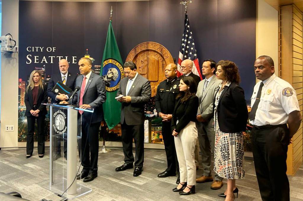 Washington state Attorney General Nick Brown speaks at a press conference alongside Seattle Mayor Bruce Harrell and other local officials on Monday, Sept. 29 at Seattle City Hall. (Photo by Jake Goldstein-Street/Washington State Standard)