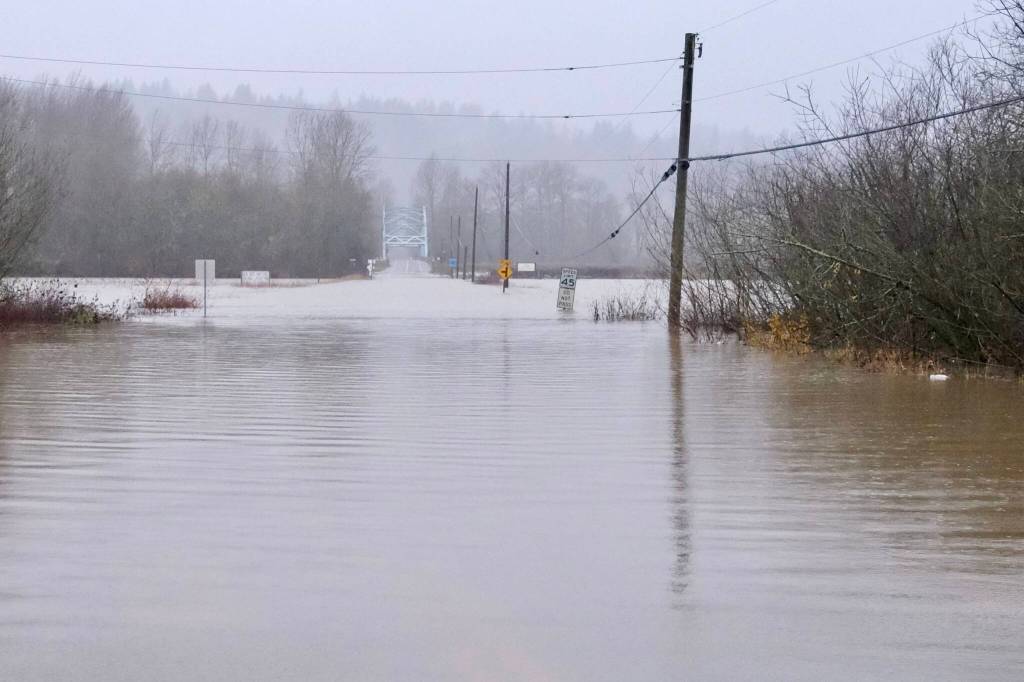 NE 124th Street, one of the two roads that takes Duvall residents across the river and quickly out of the Snoqualmie Valley, was closed due to flood water, Dec. 10, 2025. Photo by Grace Gorenflo/Sound Publishing