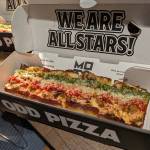 Moto Pizza Mr. Pig. Made with Filipino pork belly, spicy pork sausage, onion, Moto cheese blend, parmesan topped with tomato sauce, calamansi lime sauce and Mr. Pig sauce. Photo by Bailey Jo Josie/Sound Publishing.