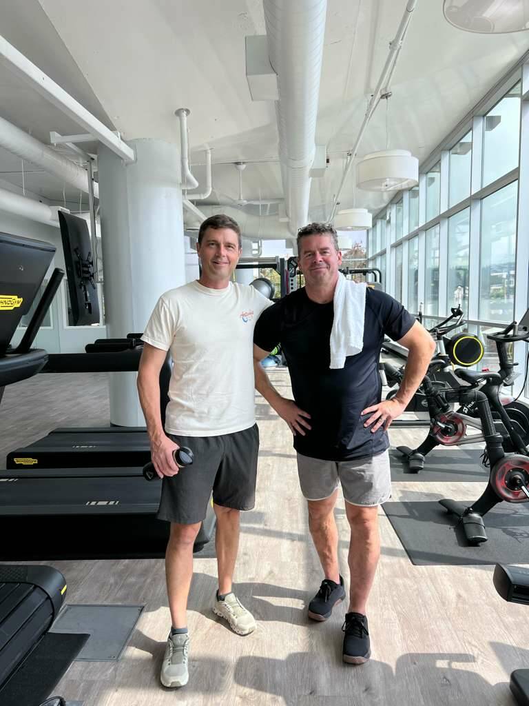 Reid, left, and Bill Wiseman at the Mercer Island Beach Club last year. Photo courtesy of Bill Wiseman