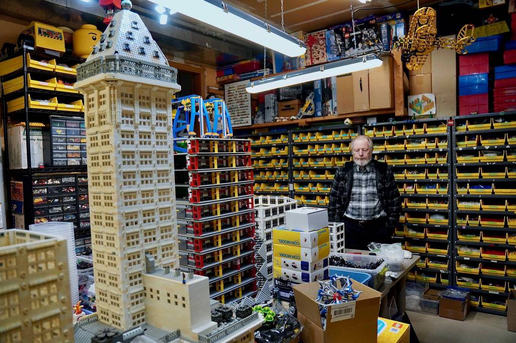 Photo by Joshua Solorzano/The Mirror
Wayne Hussey in his garage with his first Smith Tower Lego model.