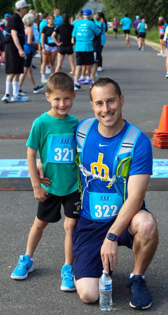 J. Kay, 7, and Anthony Kay, of Kent, participated in the annual run. COURTESY PHOTO, City of Kent